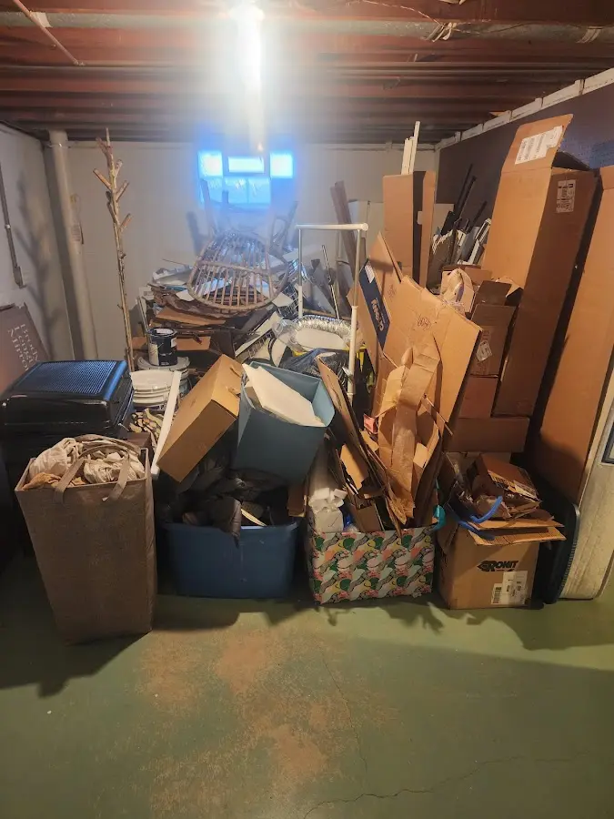 Roll-off dumpster container at job site for 6 Yard Dumpster Rental in Anoka